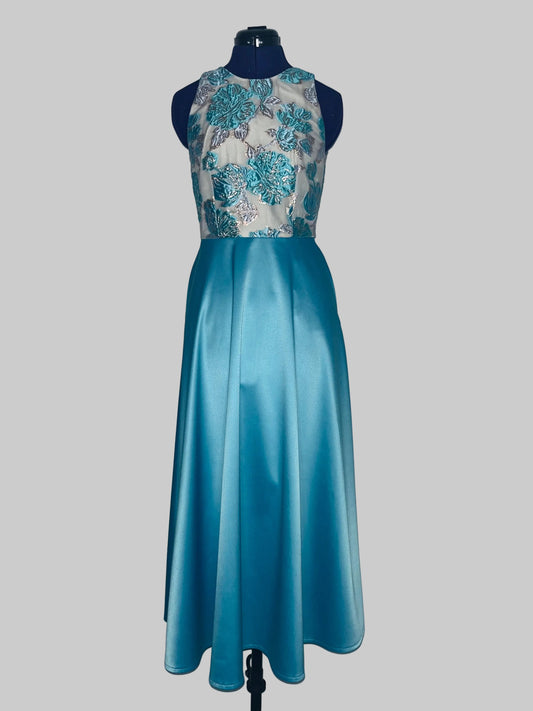 Blue dress with floral top on a mannequin against a white background